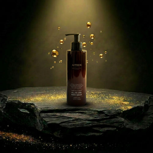 AITHER Aura Cleansing Nectar on luxury rock pedestal with golden droplets